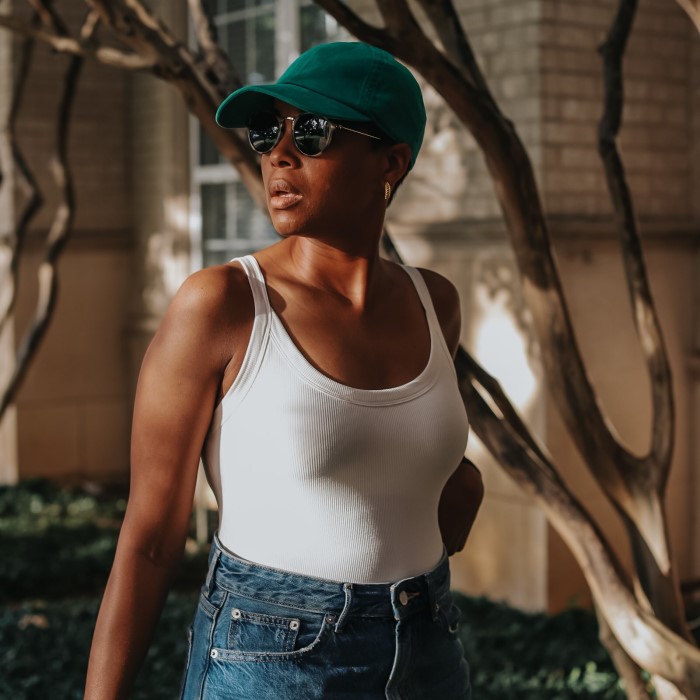 green baseball cap