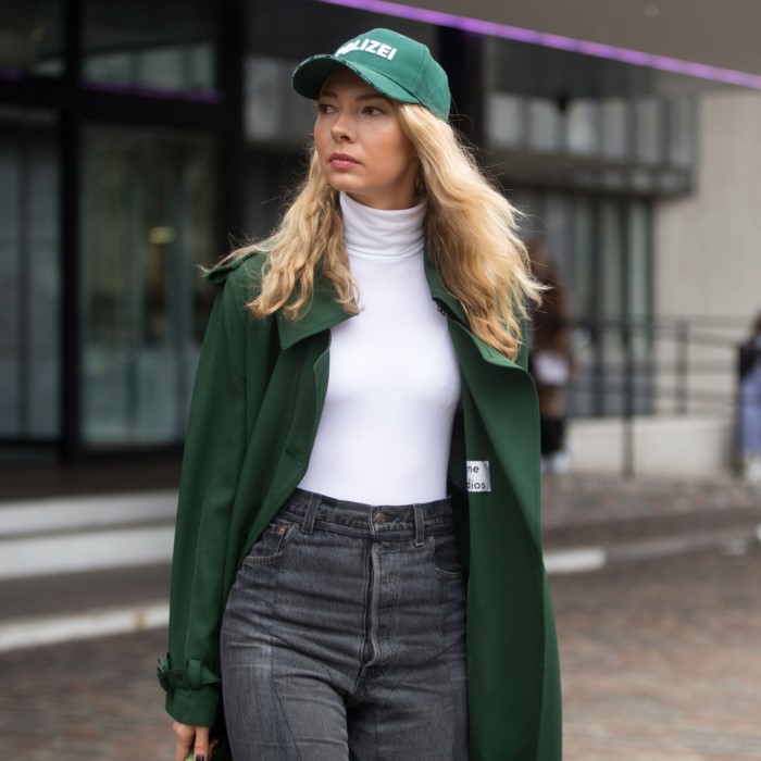 green baseball cap